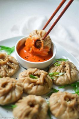  Yakfleisch Momos mit würzigem Chili-Dip: Können diese dampfenden Teigtaschen dein Herz erobern?